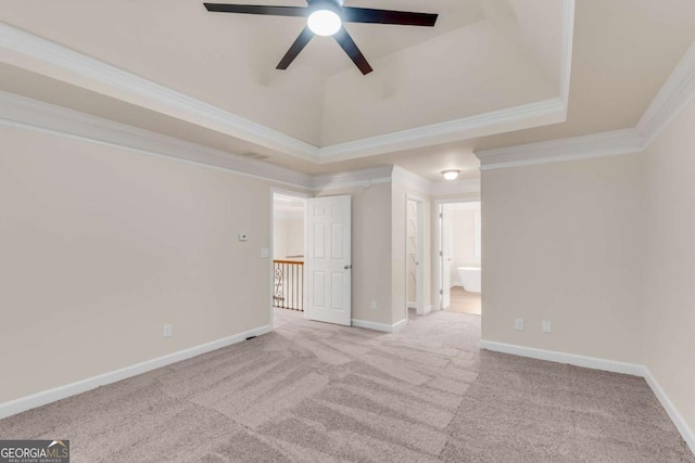 1400 Squire Ln, Cumming, GA 30041 - spare room with ornamental molding, a ceiling fan, carpet flooring, and a tray ceiling