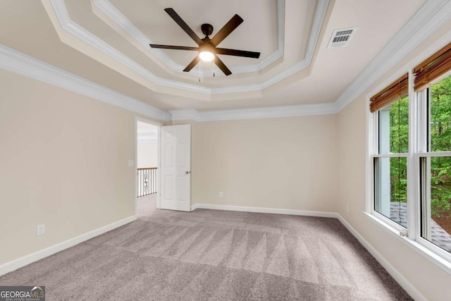 1400 Squire Ln, Cumming, GA 30041 - carpeted empty room with a raised ceiling, visible vents, crown molding, and ceiling fan