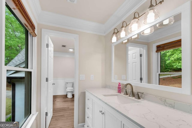 1400 Squire Ln, Cumming, GA 30041 - bathroom with toilet, visible vents, wood finished floors, vanity, and ornamental molding