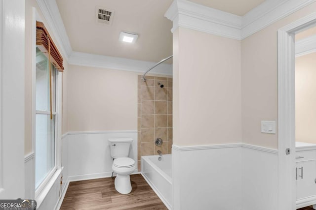 1400 Squire Ln, Cumming, GA 30041 - full bathroom featuring toilet, wainscoting, visible vents, shower / bath combination, and wood finished floors