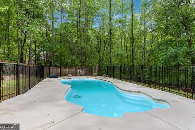 1400 Squire Ln, Cumming, GA 30041 - view of swimming pool with a fenced in pool, a patio, and fence