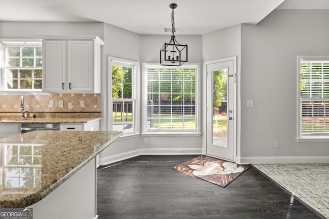 990 Lilac Arbor Rd, Dacula, GA 30019 - doorway featuring a sink, dark wood finished floors, baseboards, indoor bar, and visible vents