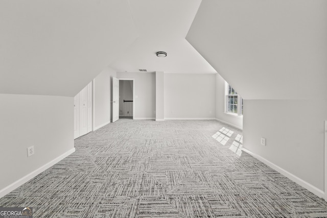 990 Lilac Arbor Rd, Dacula, GA 30019 - bonus room featuring baseboards, carpet flooring, and lofted ceiling