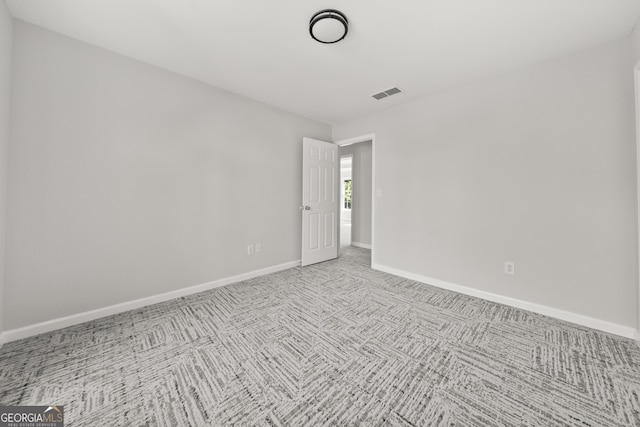 990 Lilac Arbor Rd, Dacula, GA 30019 - unfurnished room featuring baseboards, light carpet, and visible vents