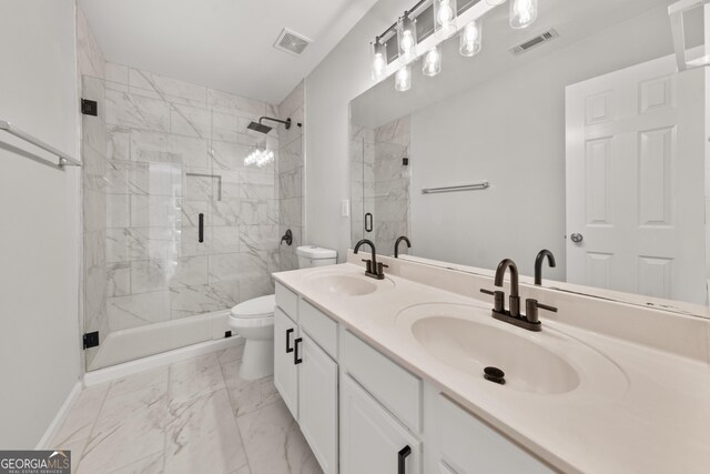 990 Lilac Arbor Rd, Dacula, GA 30019 - bathroom with visible vents, a sink, and toilet