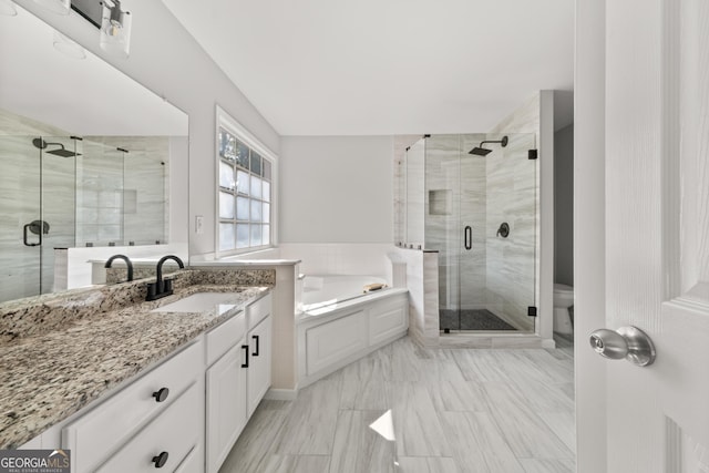 990 Lilac Arbor Rd, Dacula, GA 30019 - bathroom with a shower stall, a sink, and plenty of natural light