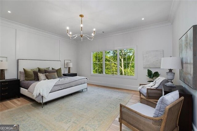 bedroom featuring recessed lighting, an inviting chandelier, ornamental molding, baseboards, and light wood-style flooring