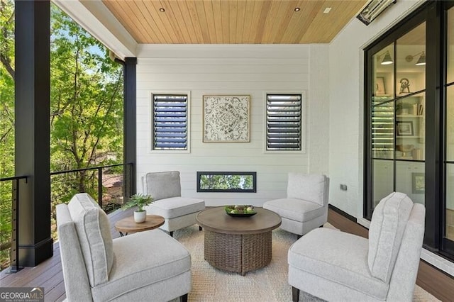sunroom / solarium featuring a wealth of natural light