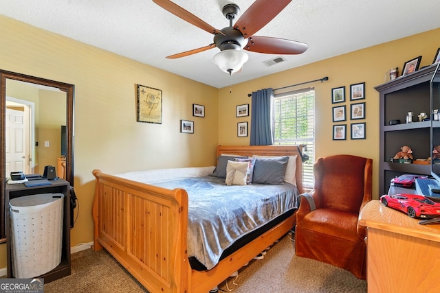 1010 Augusta Woods Dr, Douglasville, GA 30134 - carpeted bedroom featuring a ceiling fan and visible vents