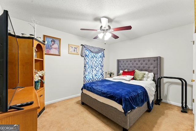 1010 Augusta Woods Dr, Douglasville, GA 30134 - bedroom featuring a ceiling fan, baseboards, and light carpet