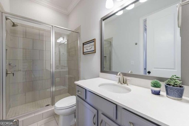 4405 Croftshire Pl, Cumming, GA 30040 - bathroom featuring crown molding, toilet, vanity, and a shower stall