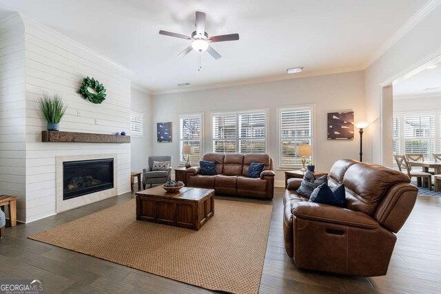 4405 Croftshire Pl, Cumming, GA 30040 - living room featuring ceiling fan, stairway, dark wood-style floors, ornamental molding, and baseboards