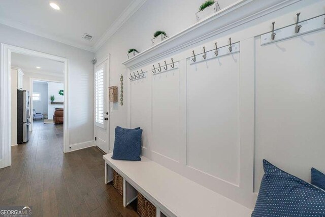 4405 Croftshire Pl, Cumming, GA 30040 - mudroom with ornamental molding, dark wood finished floors, recessed lighting, and baseboards
