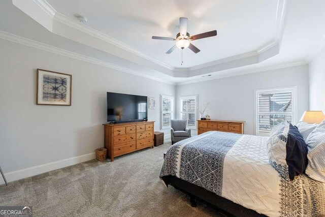 4405 Croftshire Pl, Cumming, GA 30040 - bedroom with a tray ceiling, multiple windows, carpet floors, crown molding, and baseboards