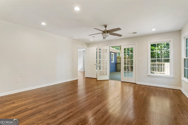1541 Pontiac Pl SE, Atlanta, GA 30315 - unfurnished living room featuring baseboards, wood finished floors, recessed lighting, and ceiling fan