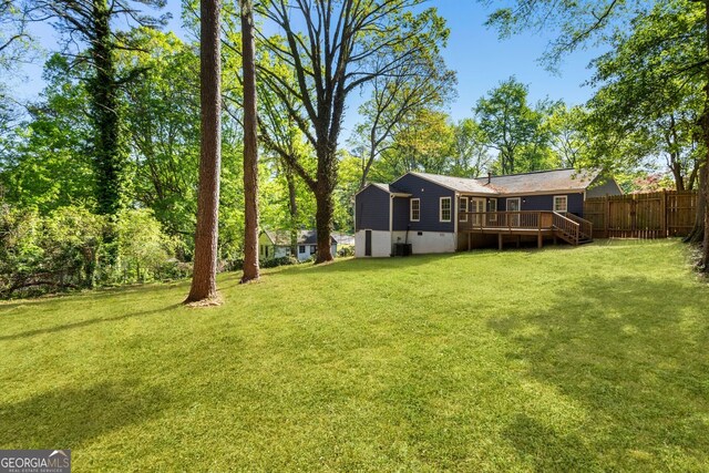 1541 Pontiac Pl SE, Atlanta, GA 30315 - view of yard with a wooden deck and fence
