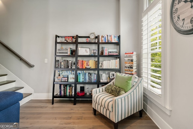 986 Mauldin St SE, Atlanta, GA 30316 - living area with baseboards, wood finished floors, and a healthy amount of sunlight