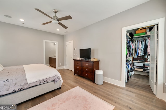986 Mauldin St SE, Atlanta, GA 30316 - bedroom with recessed lighting, baseboards, light wood-type flooring, and a spacious closet