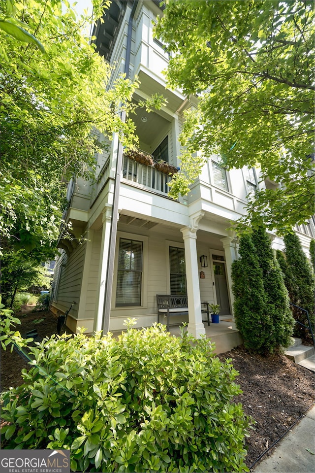 986 Mauldin St SE, Atlanta, GA 30316 - back of property featuring covered porch and a balcony