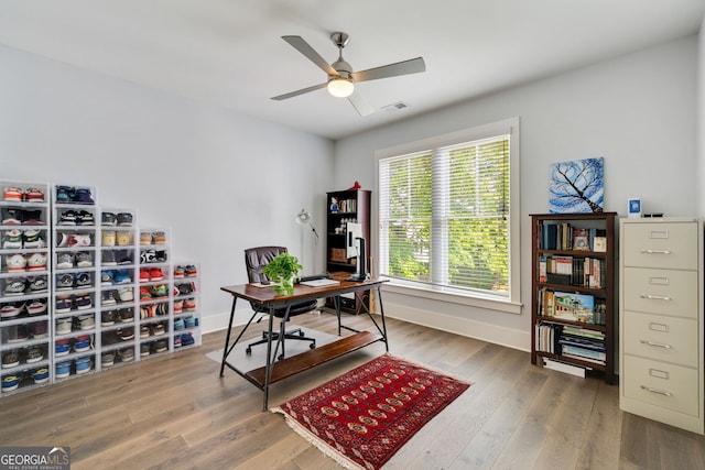 986 Mauldin St SE, Atlanta, GA 30316 - office space with visible vents, baseboards, ceiling fan, and wood finished floors