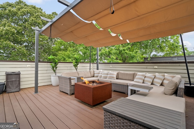 986 Mauldin St SE, Atlanta, GA 30316 - wooden terrace featuring fence and an outdoor living space with a fire pit