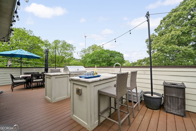 986 Mauldin St SE, Atlanta, GA 30316 - deck featuring grilling area, an outdoor kitchen, outdoor dining space, and outdoor dry bar