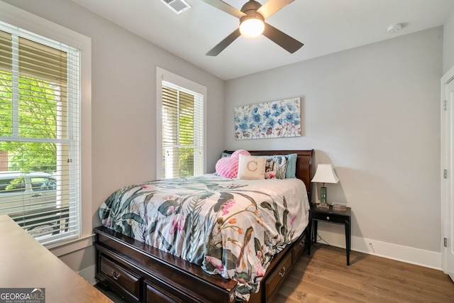 986 Mauldin St SE, Atlanta, GA 30316 - bedroom featuring baseboards, visible vents, multiple windows, and wood finished floors