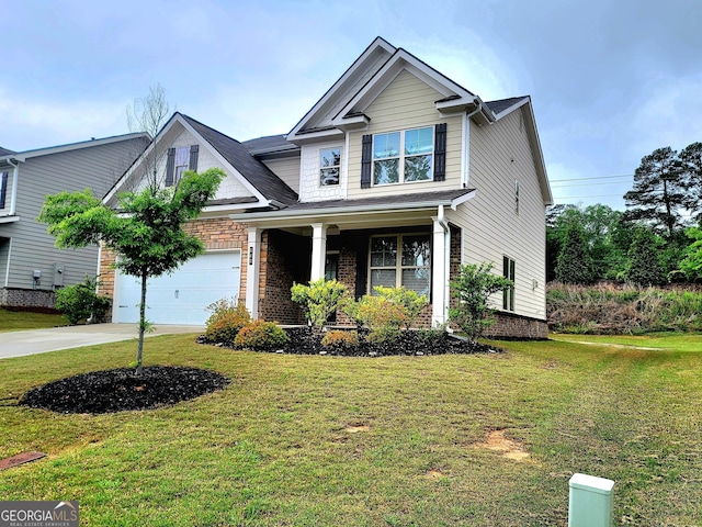view of front of property featuring a front lawn, driveway, and covered porch