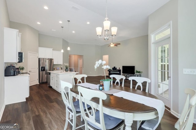 128 Clearwater Dr, Brunswick, GA 31523 - dining space featuring recessed lighting, visible vents, dark wood-style flooring, and an inviting chandelier
