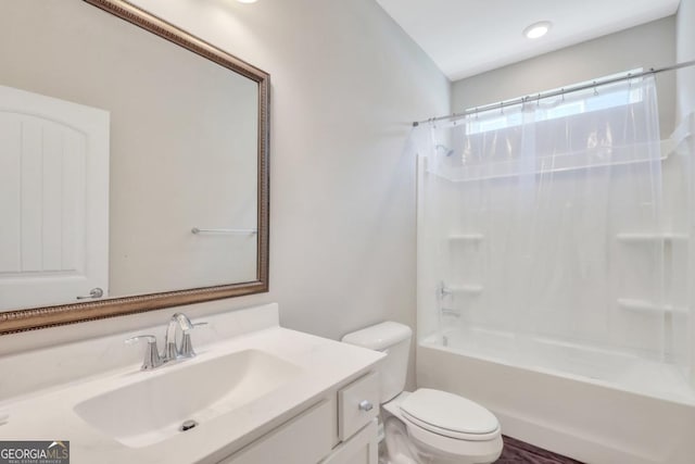 128 Clearwater Dr, Brunswick, GA 31523 - bathroom with shower / bath combo, toilet, and vanity