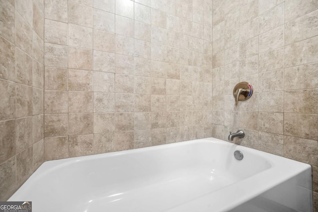 full bath featuring a bathing tub