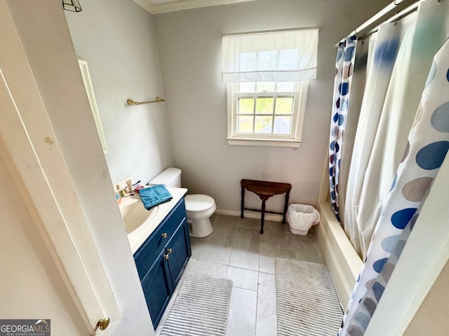 357 Douglas Hwy, Ocilla, GA 31774 - full bathroom featuring tile patterned floors, toilet, vanity, ornamental molding, and baseboards