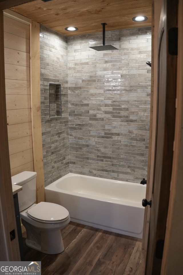 12 Mountain Creek Rd, Blue Ridge, GA 30513 - full bath featuring recessed lighting, wood finished floors, a combined bath / shower with rainfall shower, and toilet