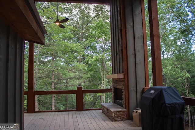 12 Mountain Creek Rd, Blue Ridge, GA 30513 - deck featuring a stone fireplace, a view of trees, and a grill