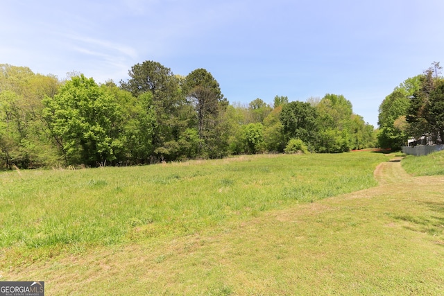 view of landscape with a view of trees