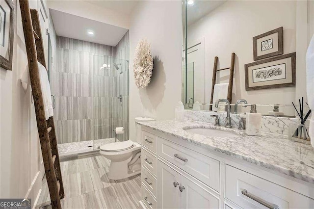 1059 Antioch Dr, Brookhaven, GA 30319 - bathroom with vanity, toilet, and tiled shower