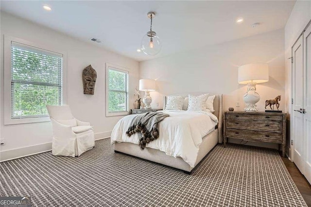 1059 Antioch Dr, Brookhaven, GA 30319 - bedroom with baseboards, recessed lighting, dark carpet, and visible vents