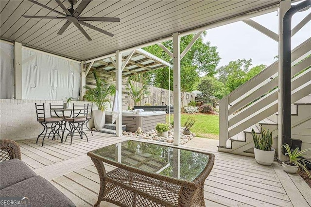 1059 Antioch Dr, Brookhaven, GA 30319 - deck featuring a fenced backyard, a ceiling fan, a hot tub, and outdoor dining space