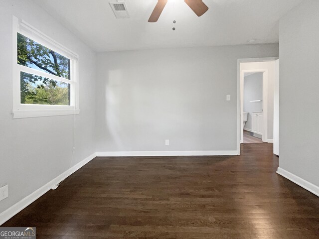 233 Banberry Dr SE, Atlanta, GA 30315 - unfurnished room featuring baseboards, a ceiling fan, dark wood-type flooring, and visible vents
