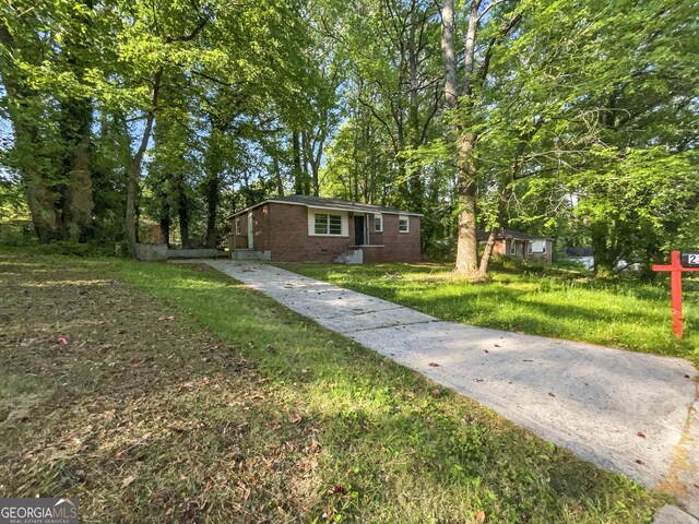 233 Banberry Dr SE, Atlanta, GA 30315 - view of front facade featuring a front lawn and brick siding