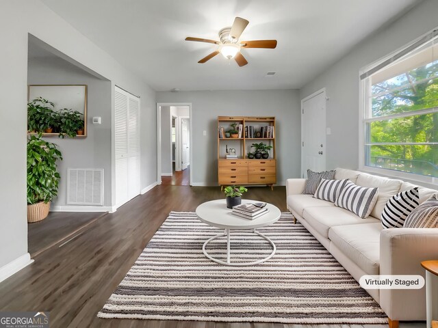 233 Banberry Dr SE, Atlanta, GA 30315 - living area featuring dark wood finished floors, baseboards, a ceiling fan, and visible vents