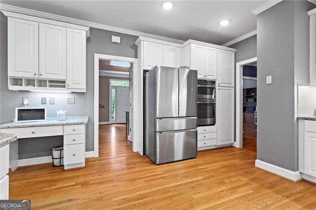 5729 Brookstone Walk NW, Acworth, GA 30101 - kitchen featuring stainless steel appliances, crown molding, white cabinetry, light wood finished floors, and recessed lighting