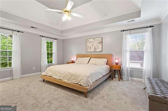 5729 Brookstone Walk NW, Acworth, GA 30101 - carpeted bedroom with baseboards, a tray ceiling, ornamental molding, and ceiling fan