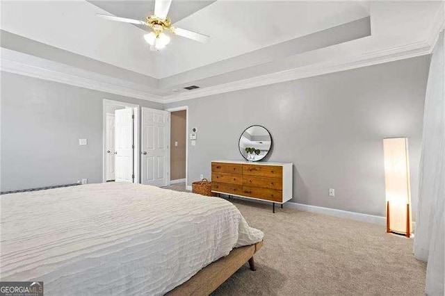 5729 Brookstone Walk NW, Acworth, GA 30101 - carpeted bedroom featuring a tray ceiling, crown molding, baseboards, and a ceiling fan