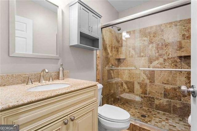 5729 Brookstone Walk NW, Acworth, GA 30101 - full bathroom with toilet, a stall shower, and vanity