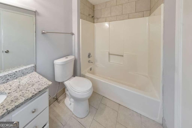 bathroom with vanity, shower / washtub combination, baseboards, toilet, and tile patterned flooring