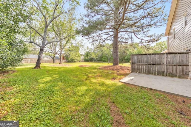 view of yard featuring fence