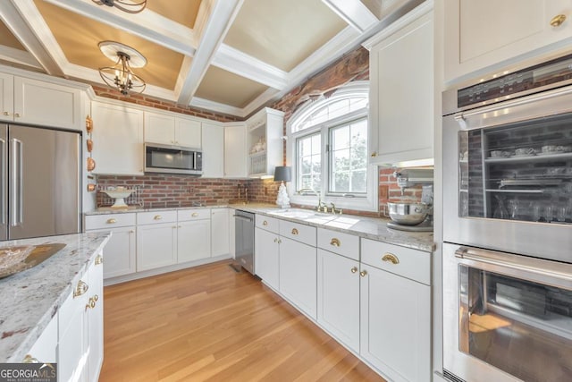 988 Hunters Rdg, Jasper, GA 30143 - kitchen with a sink, coffered ceiling, white cabinets, and stainless steel appliances
