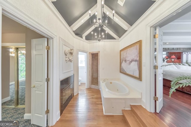 988 Hunters Rdg, Jasper, GA 30143 - corridor featuring ornamental molding, an inviting chandelier, lofted ceiling with beams, and wood finished floors