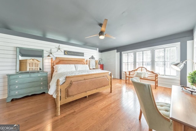 988 Hunters Rdg, Jasper, GA 30143 - bedroom featuring a ceiling fan, wood walls, and wood finished floors